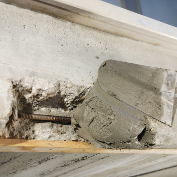 Naprawa i wykańczanie betonu, murów i systemów konstrukcyjnych